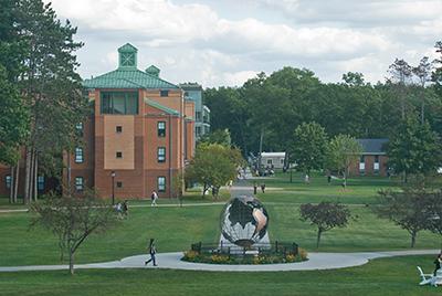 The campus green, with Courtney Hall, as seen from the Ely Campus Center