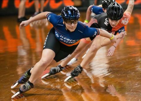 Westfield State student Jeilyn Godin skates in an inline speed skating race.