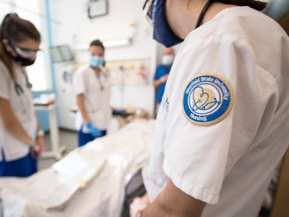 nurses working in the simulation lab in the Stevens Center