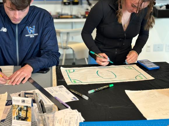 students working on banners RIDE