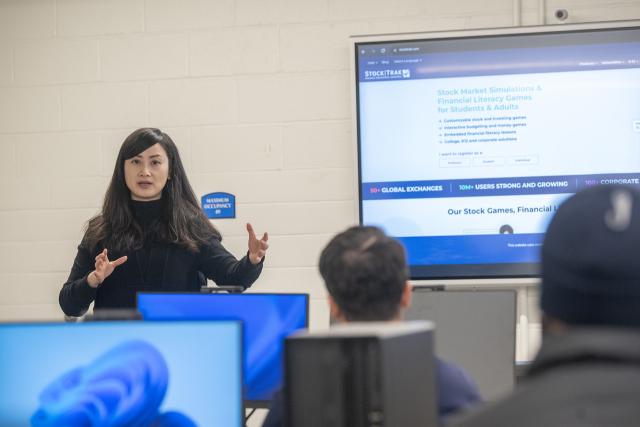 Professor delivering a lecture in the new Finance & Data Analytics Lab