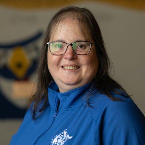 SGA Vice President of Academic Life Melissa wearing a blue shirt smiling.