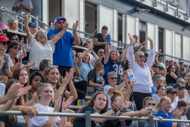 Crowd in the bleachers at a Westfield State football game.