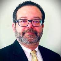 Headshot of Charles DiStefano.